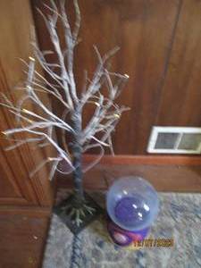 lot 35 image: Fiber optic light up tree decor and other Misc piece of decor