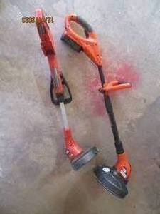 lot 3 image: Pair of battery operated Black and Decker weed whips