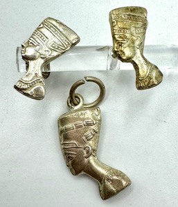 lot 96 image: Pair of Silver Colored Pharaoh Earrings and Pendant