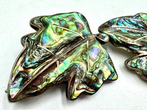 lot 136 image: Pair of Vintage Mother of Pearl and Sterling Leaf Shaped Pins