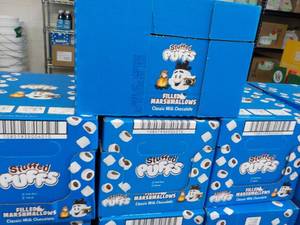 lot 406 image: 4 boxes Stuffed Puffs Chocolate Filled Marshmallows Best By 05212023