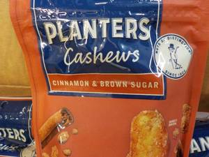 lot 545 image: 12 x 5 oz Bags Planters Cashews Cinnamon and Brown Sugar past best date