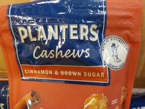 lot 546 image: 12 x 5 oz Bags Planters Cashews Cinnamon and Brown Sugar past best date