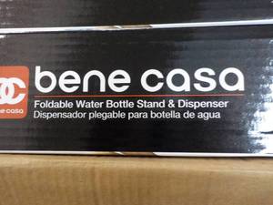 lot 74 image: 4 Benecasa Foldable Water Bottle Stand and Dispenser