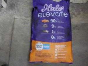lot 91 image: 20 lb. Bag Halo Evevate Puppy Food...
