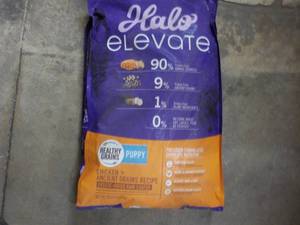 lot 93 image: 20 lb. Bag Halo Evevate Puppy Food...