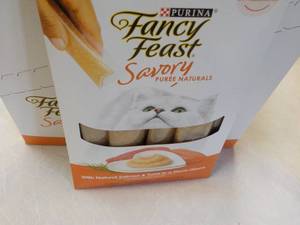 lot 132 image: 30 ct Purina Fancy Feast Savory Cat Treats Natural Salmon and Tuna in a Demi Glaze best date 082023 Retail $90 total