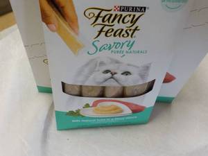 lot 137 image: 30 ct Purina Fancy Feast Savory Cat Treats Natural Tuna in a Demi Glaze best date 082023 Retail $90 total