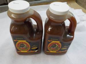 lot 187 image: 2 Jugs Calvin and Cleos Bloody Mary Mix