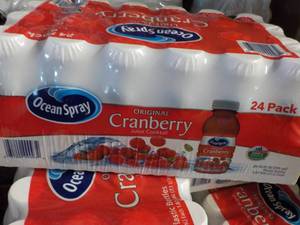 lot 228 image: 24 pack Ocean Spray Cranberry Juice...