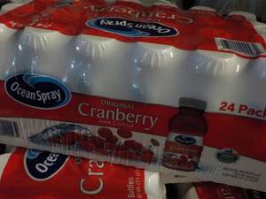 lot 230 image: 24 pack Ocean Spray Cranberry Juice...