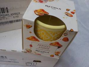 lot 87 image: 12 Regina Persian Amber Candles...
