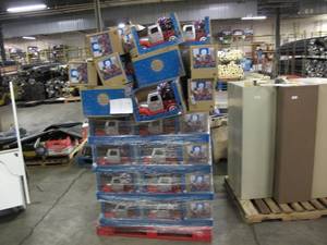 lot 140 image: Pallet of Store Overstock Store and Ecommerce Product - Holiday Light Up Trucks