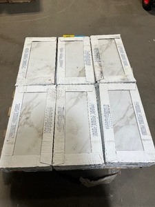 lot 50 image: Marazzi Sanden Calacatta Gold Marble Matte 12 in. x 24 in. Glazed Porcelain Floor and Wall Tile (15.6 sq. ft.Case) Customer Returns See Pictures