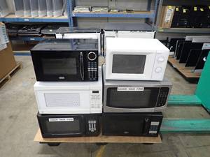 Pallet of 12 Microwaves  all removed from a working environment  may need to be wiped out