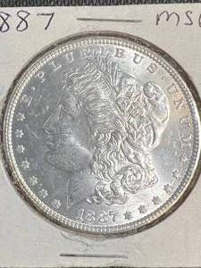1887 US MORGAN SILVER DOLLAR MS64