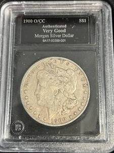1900-OCC MORGAN SILVER DOLLAR VG IN BOX