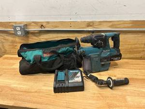 lot 87 image: MAKITA Hammer Drill with HEPA Filter, Charger, Battery and Bag