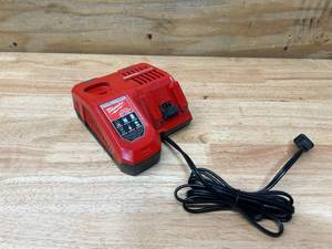 lot 104 image: MILWAUKEE M12 and M18 12-Volt18-Volt Lithium-Ion Multi-Voltage Rapid Battery Charger
