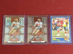 lot 13 image: (3) Joe Montana Cards