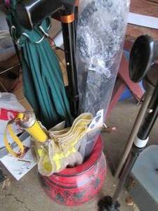lot 194 image: Large decorative vase full of assorted walking cane aids and umbrellas