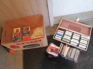 lot 202 image: Vintage 8-track tapes with case, cassette tapes and CD collection from a variety of artists
