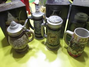lot 219 image: Collectible Avon Lidded Steins eith original boxes and Budweiser stein