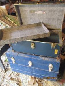 lot 78 image: Vintage Blue painted wood Storage trunk with metal trim and accents as well as a thick leather handle on each end approximately 3218.521.5 Plus a vintage storage trunk measuring about 311715