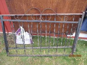 lot 98 image: Pair of (2) decorative wrought iron gatefence sections approximately 52 long and 3ft high