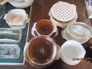 lot 100 image: Assortment of Vintage Corning Ware with varying patterns such as Wheat leaf, onions and mushrooms as well as a brown and plain milk glass style