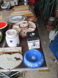lot 136 image: Potato Shaped Sour Cream dish, compartmentalized serving platter, stack of cutting boards and other assorted kitchen helpers
