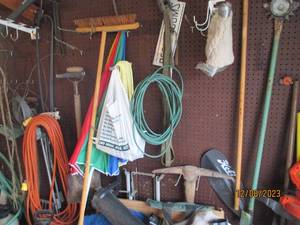 lot 165 image: Large variety of lawn and garden tools and supplies including long handle lawn tools, chemical sprayers, extension cords, blowervacs and more