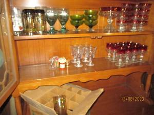 lot 226 image: Beautiful assortment of depression glassware in hues of green, red & clear as well as clear, toothpicks with holders and other collectible glassware