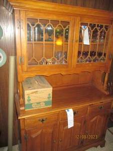 lot 227 image: Vintage Mission style Buffet Hutch with 3 lower drawers and cabinets for storage and 2-wood framed glass doors up top for display