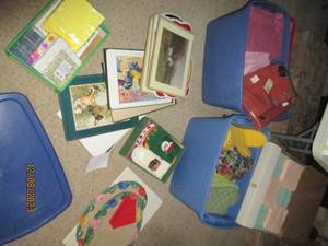lot 232 image: Large variety of place mats, napkins, oven mitts, fingertip towels, table coverings and more (most seem to be brand new)