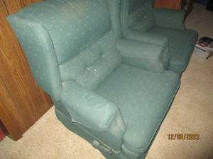 lot 243 image: Pair of dark green Upholstered Rocking Recliners