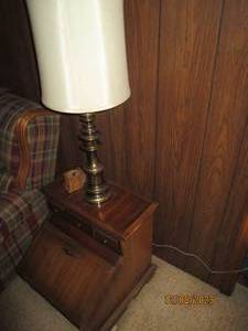 lot 249 image: Vintage toy-chest style end table with a drop down lid and faux front drawers. Includes tall brass base lamp and horse themed coasters