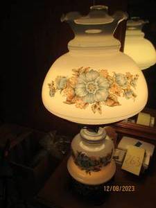 lot 266 image: Vintage decorative floral glass and heavy metal hurricane bulb style lamp