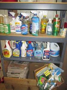 lot 22 image: Content of utility room shelf to include a variety of household cleaners and supplies (shelving g unit not included)