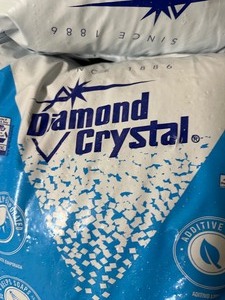lot 94 image: Diamond Crystal 804017 Solar Naturals Water Softener Salt, 50 Lbs - New damaged bag