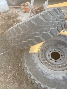 lot 24 image: (2) Humvee Wheels & Tires