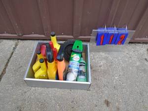 lot 112 image: Flat of auto chemicals. Gas deice, slime, etc. As shown.