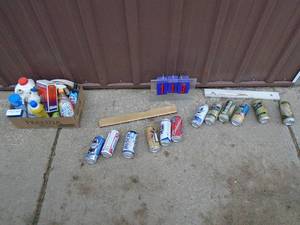 lot 113 image: Qty of 2 redneck wind chimes & box of misc. chemicals. As shown.