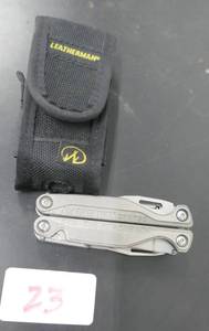 lot 23 image: actual Leatherman Charge model, titanium