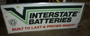 lot 81 image: Aluminum Interstate Batteries sign
