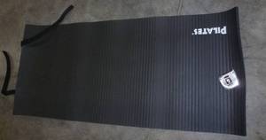 lot 84 image: yoga mat and sleeping bag mat