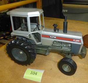 lot 104 image: White 2-135 farm tractor toy