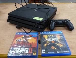 lot 139 image: PS4 system and 2 games