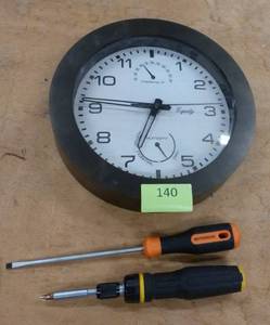 lot 140 image: Clock and 2 screwdrivers
