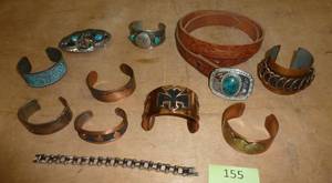 lot 155 image: Lot of copper bracelets, belt buckles